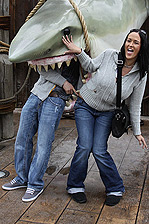 Carmella laughs as Scott gets eaten by a great white shark