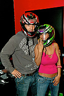 Priya and Keiran in their karting helmets