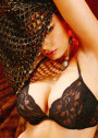 Aria Giovanni finally removes her robe and shows off her lowcut bra